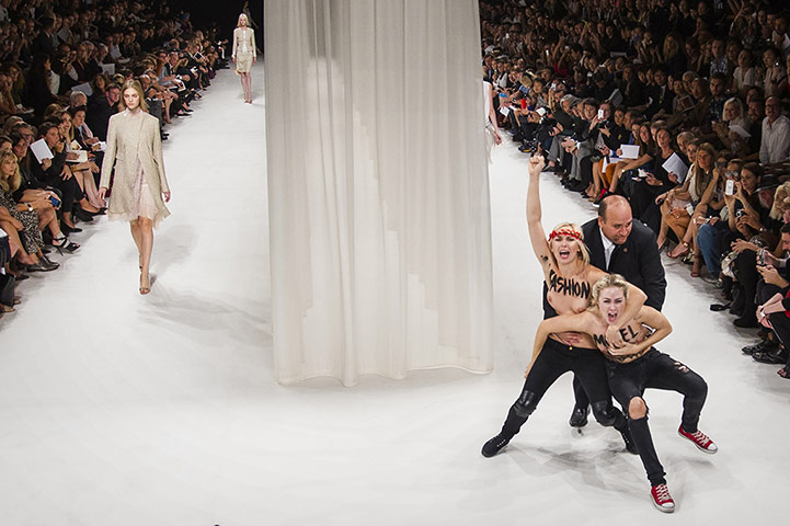 20 Photos: Femen activists demonstrate during Nina Ricci's show in Paris