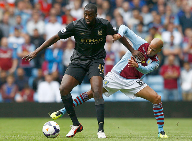 football: Karim El Ahmadi challenges Yaya Toure