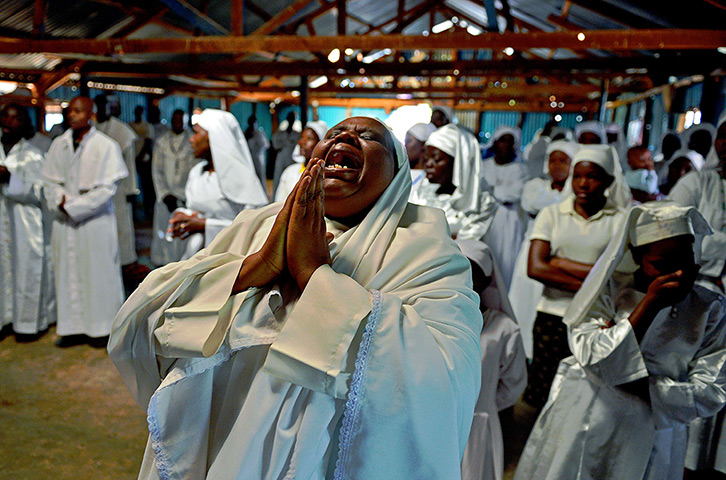 Weekend in pictures: Nairobi, Kenya: A woman screams during a special prayer for the victims of 