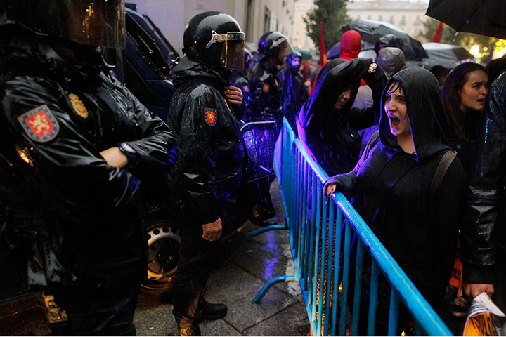 Weekend in pictures: Madrid, Spain: Protesters shout at the police during a demonstration callin