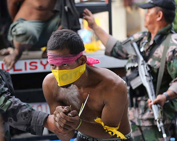 Weekend in pictures: Zamboanga city, Philippines: Suspected Muslim rebels whom the military said