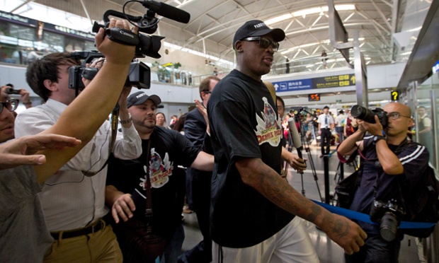 Former NBA star Dennis Rodman is attracting some media attention in the departure hall of Beijing International Capital Airport on his way to North Korea for the second time this year to visit his friend, the communist nation's leader, Kim Jong-un.