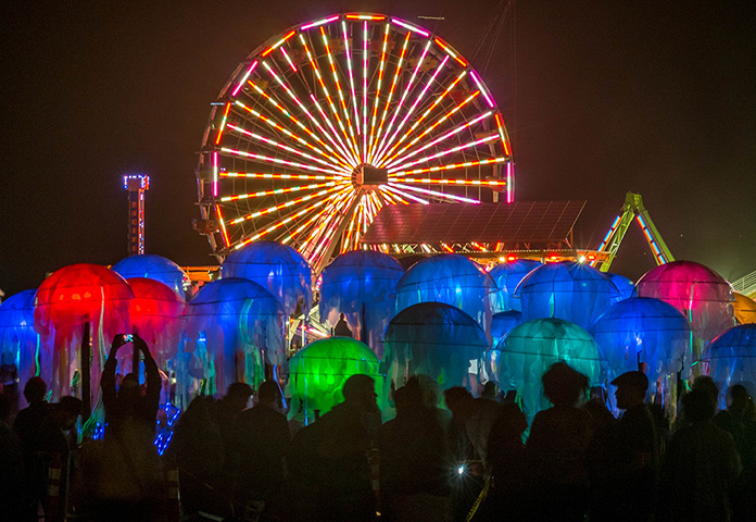 Glow Santa Monica: Visitors view a swarm of interactive jellyfish created by the group of arti
