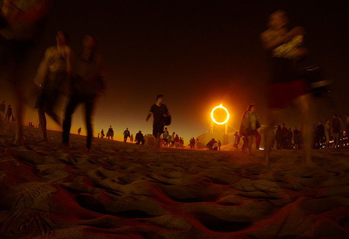 Glow Santa Monica: Visitors wait to see the creation of French artist Mathieu Briand titled 6:
