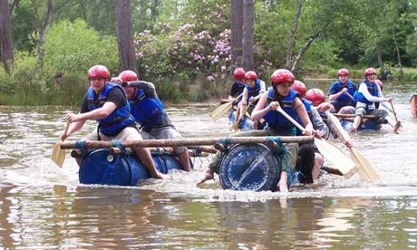 Postgraduates students rafting as part of their teambuilding exercises.