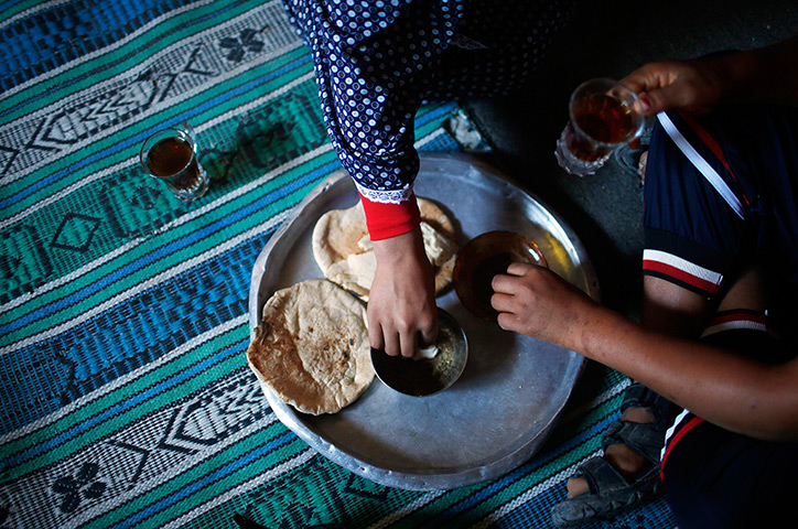 Young newlyweds: The couple eat breakfast at their house 
