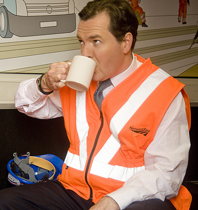 Hi-vis Osborne: George Osborne drinking tea from a mug during a visit to Swindon, Wiltshire