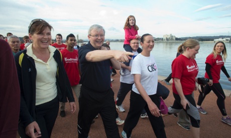 The Prime Minister Kevin Rudd walks around lake Burley Griffin in Canberra this morning with local candidates, members and senators.