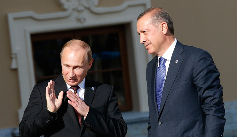 G20 official welcome: Turkey's Prime Minister Recep Tayyip Erdogan, right, speaks with President 