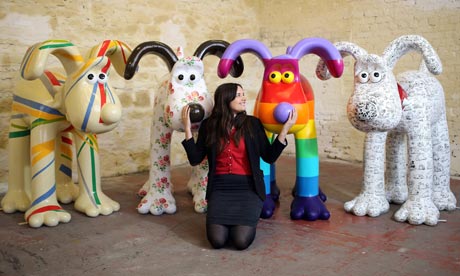 Artists sits with her Gromit Unleashed project