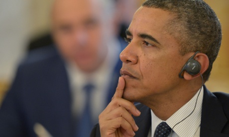 And Barack Obama listens intently.
