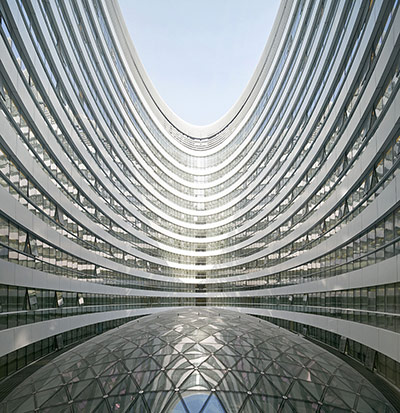 An extraordinary wide-angle view of the Galaxy Soho in Beijing, showing the atrium and glazed skylight