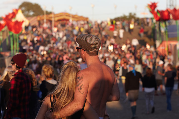 Bestival 2013: A couple look out over the festival site