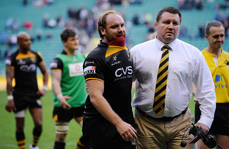 Rugby at Twickenham: Andy Goode is consoled by his coach Dai Young 