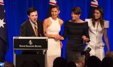 A (presumably well-refreshed) intruder crashes the stage after Tony Abbott's victory speech.