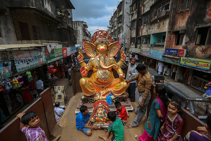 Hindu God Ganesha : A golden statue of the Lord Ganesha