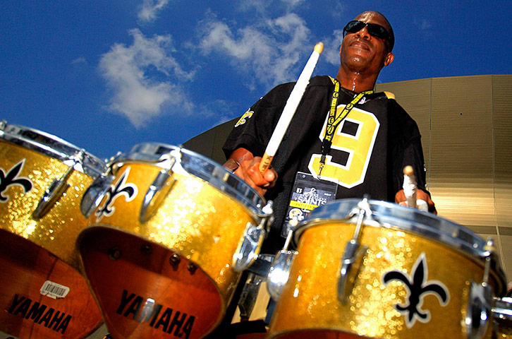 NFL Week One Gallery: New Orleans Saints fans celebrate outside the Superdome in New Orleans