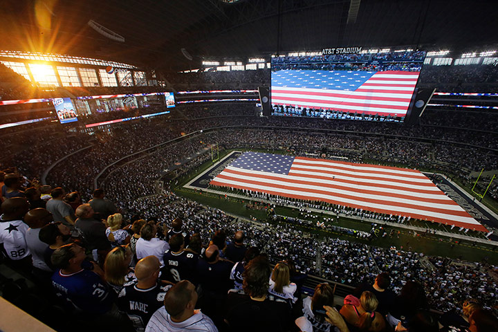 NFL Week One Gallery: The U.S. national anthem is played at the AT&T Stadium