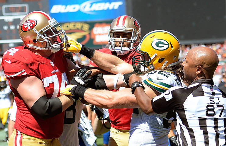 NFL Week One Gallery: Clay Matthews of the Green Bay Packers and Joe Staley