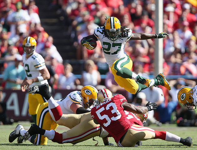 NFL Week One Gallery: Running back Eddie Lacy of the Green Bay Packers leaps