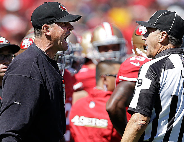 NFL Week One Gallery: San Francisco 49ers head coach Jim Harbaugh yells