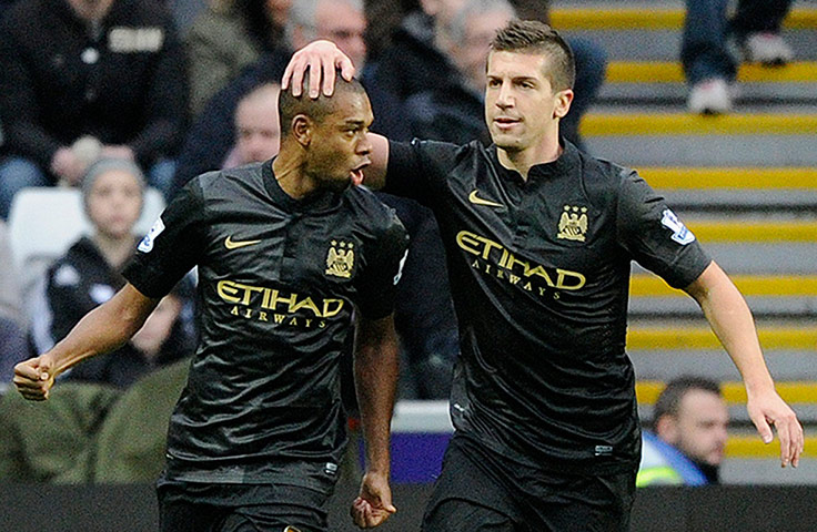 Premier New Years Day : Manchester City's Fernandinho, left, celebrates with Matija Nastasic