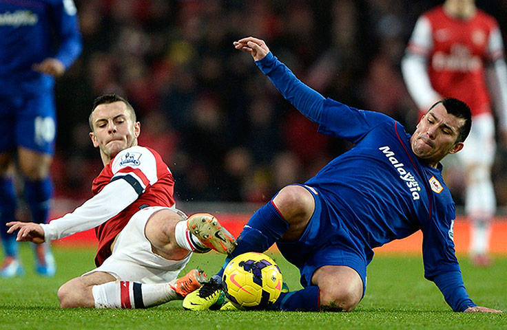 Premier New Years Day : Arsenal's Jack Wilshere stetches for the ball