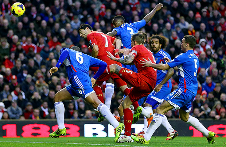 Premier New Years Day : Liverpools' Luis Suarez heads in a goal against Hull City