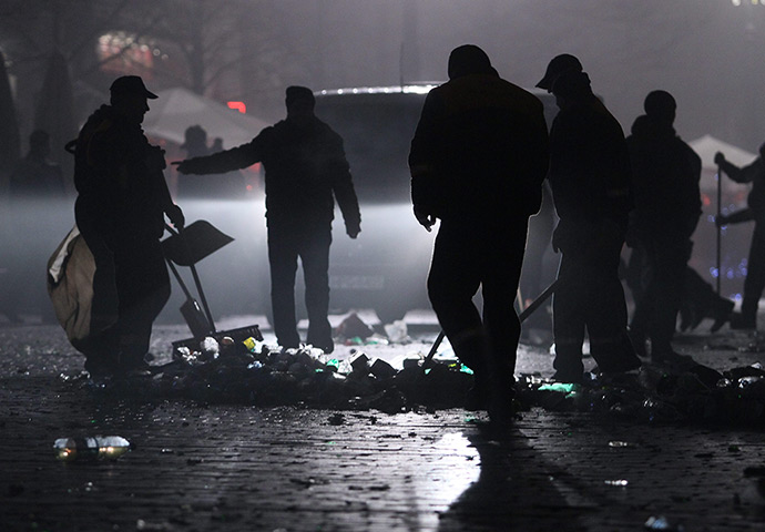 Photo highlights: Municipal employees clean up the Old Market after a New Year celebrations i