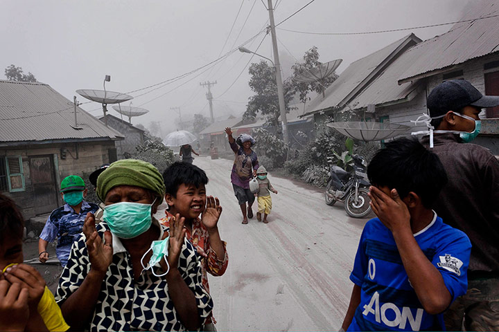 From the agencies: Villagers Panic As Mount Sinabung's Volcanic Ash Reaches Their Homes