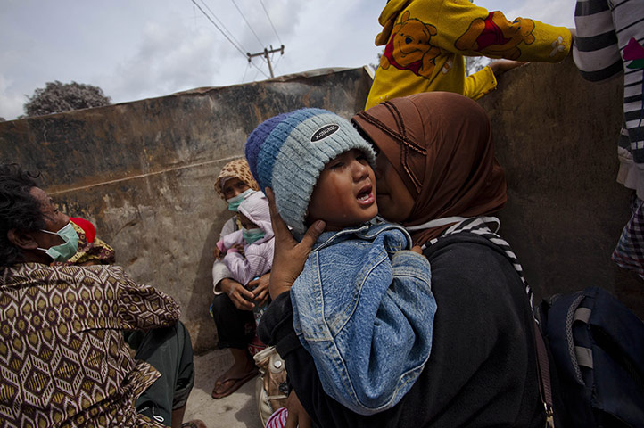 From the agencies: Villagers Panic As Mount Sinabung's Volcanic Ash Reaches Their Homes
