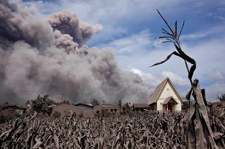 From the agencies: Villagers Panic As Mount Sinabung's Volcanic Ash Reaches Their Homes
