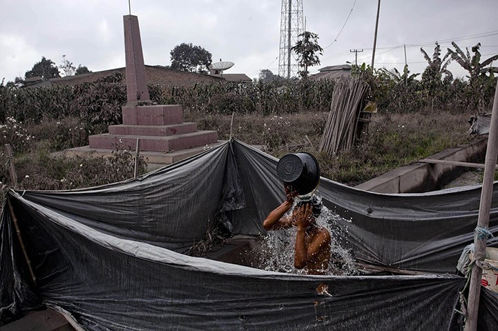 From the agencies: Villagers Panic As Mount Sinabung's Volcanic Ash Reaches Their Homes