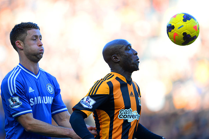 hull v chelsea: Gary Cahill keeps an eye on Yannick Sagbo