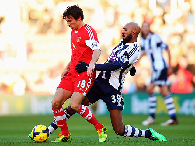 Southampton v West Brom: Jack Cork holds off the challenge of Nicolas Anelka