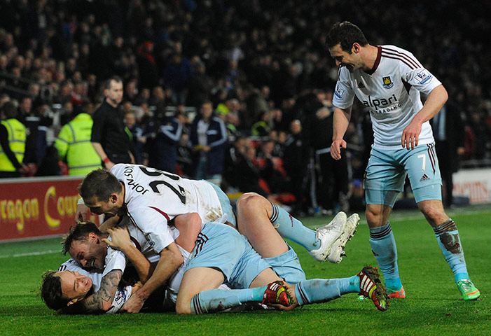 saturday roundup: West Ham United's captain Noble celebrates 