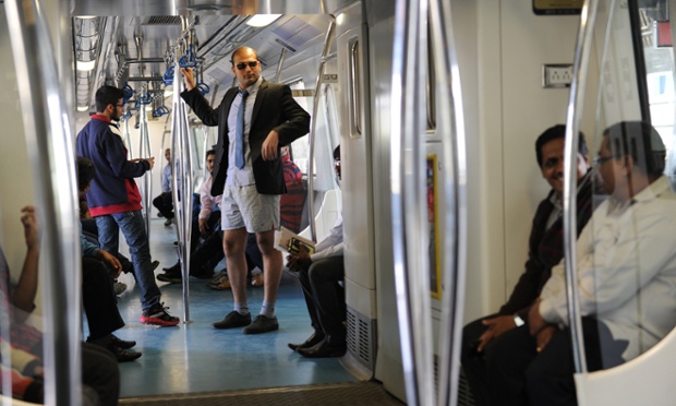 An Indian commuter takes part in a No Pants Subway Ride on the metro in Bangalore