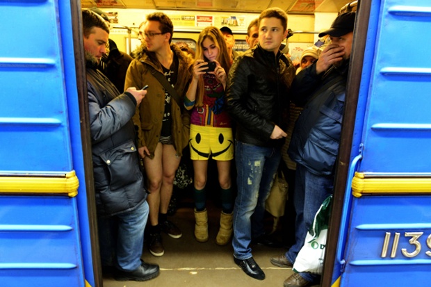 Smile: People in underwear wait in a train at the Kiev subway.