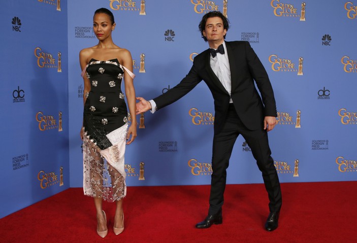 Globes fashion photobombs: Zoe Saldana and Orlando Bloom