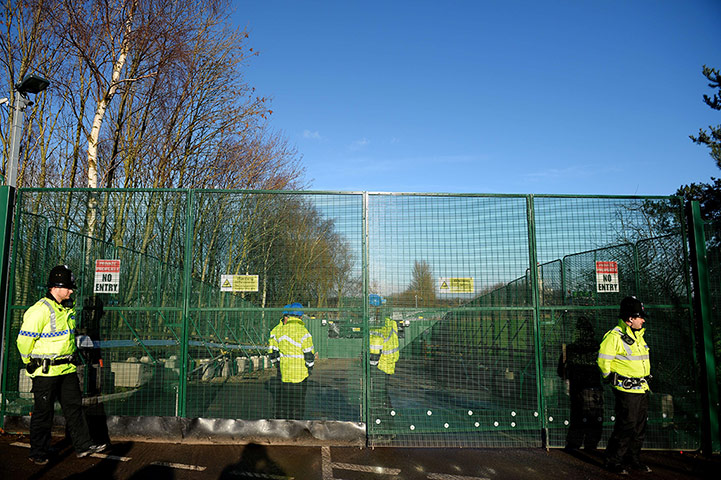 Anti-fracking protest: Police officers stand guard at the gates, Barton Moss
