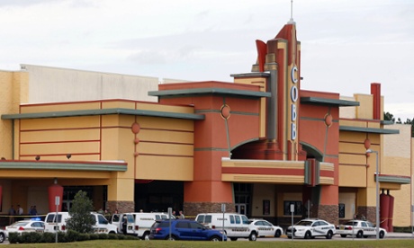 Police vehicles outside the Cobb Grove movie theatre in Wesley Chapel, Florida, after one moviegoer shot another during an argument over text messaging.