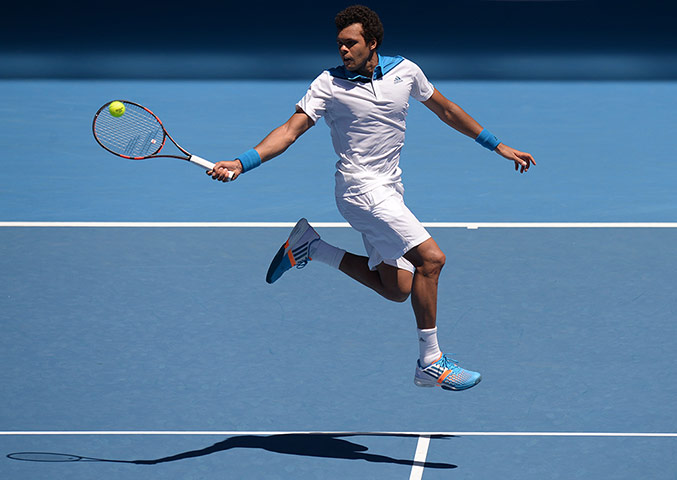 Aussie open day 2: Jo-Wilfried Tsonga plays a shot