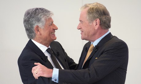 Publicis Group CEO Maurice Levy (L) embr