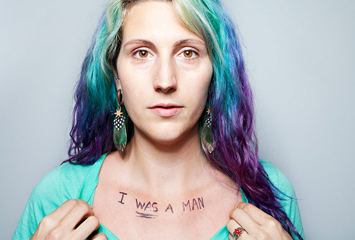 Big Picture - What I Be: woman with blue and purple hair and writing on chest