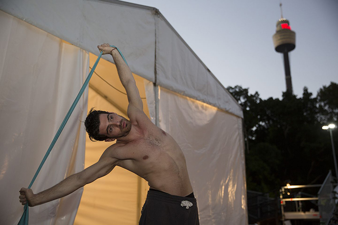 Limbo: Mikael Bres Aerial acrobat and beatboxer stretches
