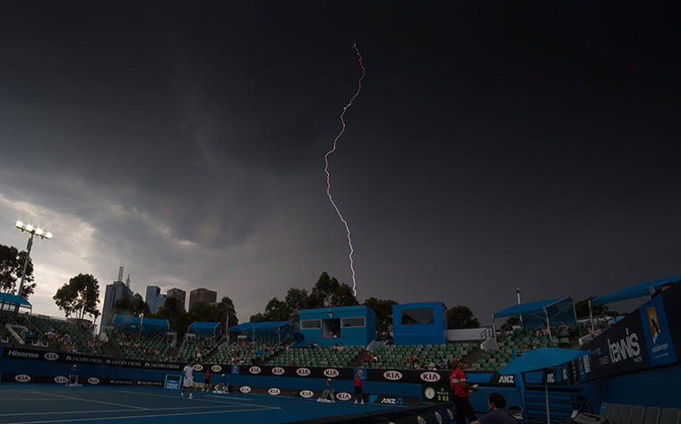 Australian Open heat: Lightning strikes the sky during the second round match between Fernando Ve