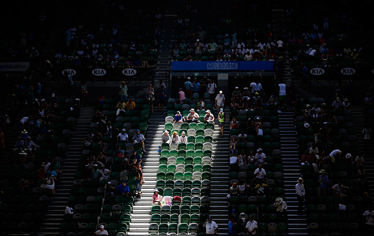 Australian Open heat: Light can be seen on seats after the roof of the Rod Laver Arena is closed 