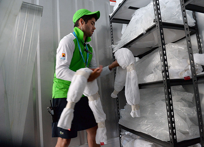 Australian Open heat: James O'Grady of court services and operations prepares ice vests and ice f