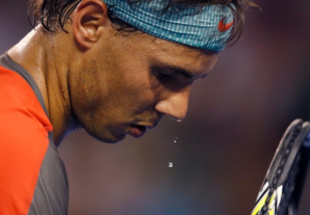 Here beads of the sweat drop off from the nose of Rafael Nadal during his second round match against Thanasi Kokkinakis at the Australian Open.