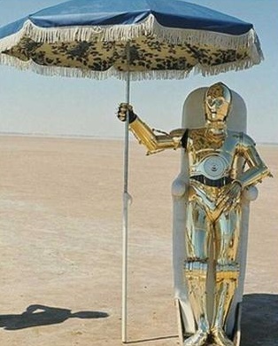 Anthony Daniels, as C-3PO, tries to cool off.